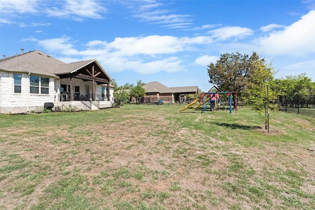 view of yard with a playground