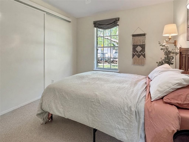 5306 Wellington Dr, Austin, TX 78723 - carpeted bedroom with a closet and baseboards