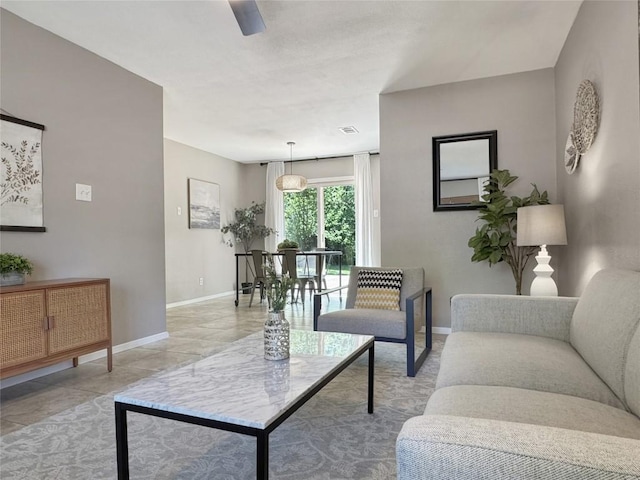 5306 Wellington Dr, Austin, TX 78723 - living room with a ceiling fan and light tile patterned floors