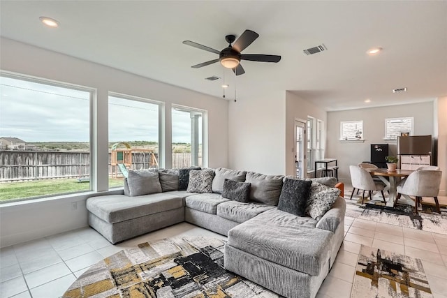 650 Texas Sage Loop, Buda, TX 78610 - living room featuring light tile patterned flooring, ceiling fan, visible vents, and recessed lighting