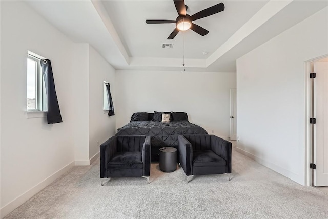 650 Texas Sage Loop, Buda, TX 78610 - bedroom with visible vents, a tray ceiling, baseboards, and carpet floors