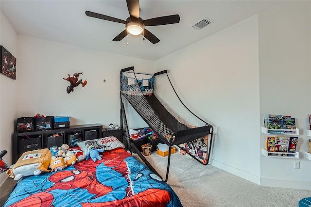 650 Texas Sage Loop, Buda, TX 78610 - bedroom with visible vents, ceiling fan, carpet floors, and baseboards