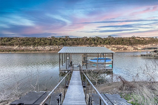 dock featuring a water view and boat lift