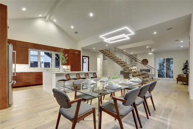 5001 Shoal Creek Blvd, Austin, TX 78756 - dining room with high vaulted ceiling, stairway, recessed lighting, light wood finished floors, and beamed ceiling