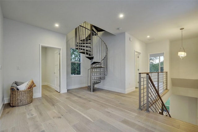 5001 Shoal Creek Blvd, Austin, TX 78756 - empty room with light wood-style flooring and recessed lighting