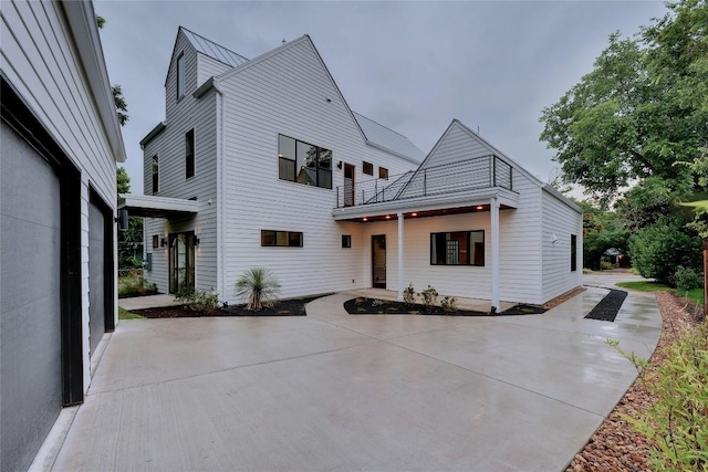 5001 Shoal Creek Blvd, Austin, TX 78756 - view of front of home with a balcony and a patio area
