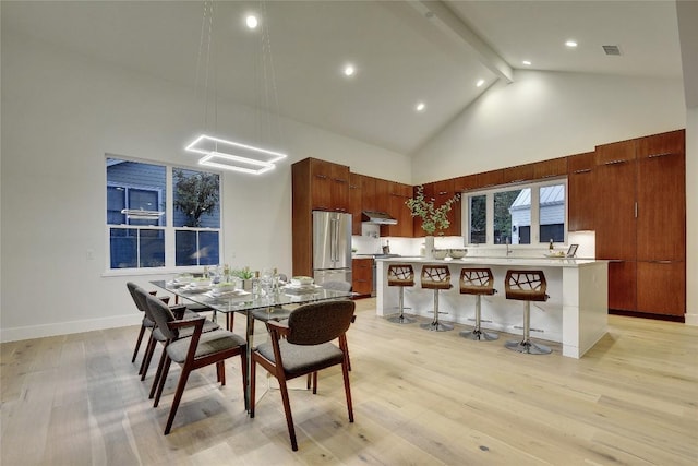 5001 Shoal Creek Blvd, Austin, TX 78756 - dining room featuring high vaulted ceiling, beam ceiling, light wood-type flooring, and recessed lighting