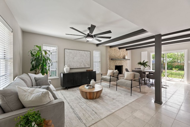 8014 Stillwood Ln, Austin, TX 78757 - living area featuring ceiling fan, beamed ceiling, and a fireplace