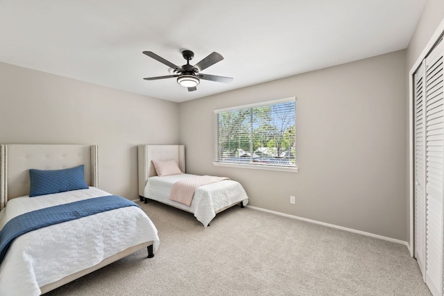 8014 Stillwood Ln, Austin, TX 78757 - bedroom featuring a closet, carpet flooring, a ceiling fan, and baseboards