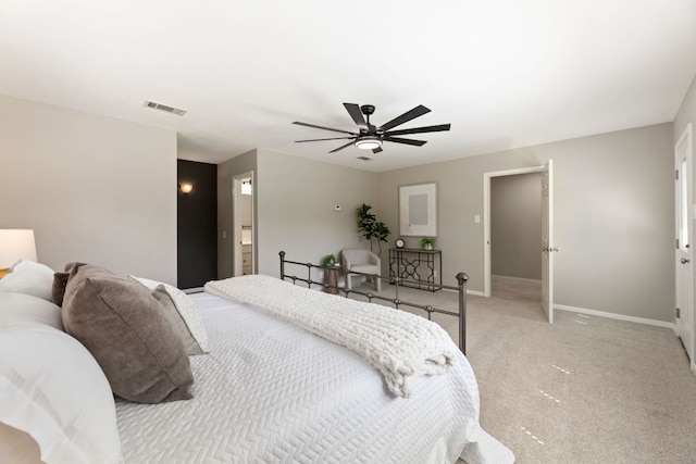 8014 Stillwood Ln, Austin, TX 78757 - bedroom with light colored carpet and a ceiling fan