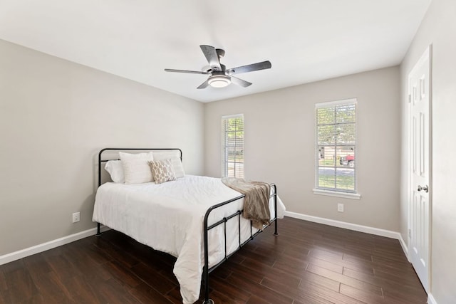 8014 Stillwood Ln, Austin, TX 78757 - bedroom with wood finished floors and ceiling fan