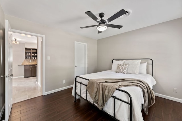 8014 Stillwood Ln, Austin, TX 78757 - bedroom with ceiling fan, dark wood finished floors, and baseboards