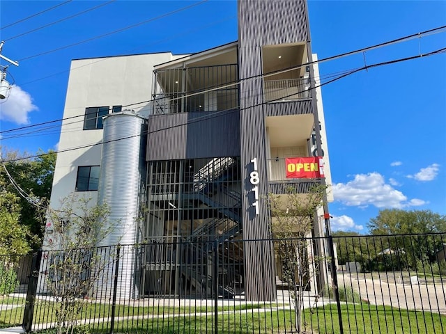 1811 Webberville Rd Unit 1206, Austin, TX 78721 - view of property featuring stairway