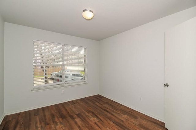 13604 Sierra Wind Ln, Elgin, TX 78621 - empty room featuring wood finished floors and baseboards