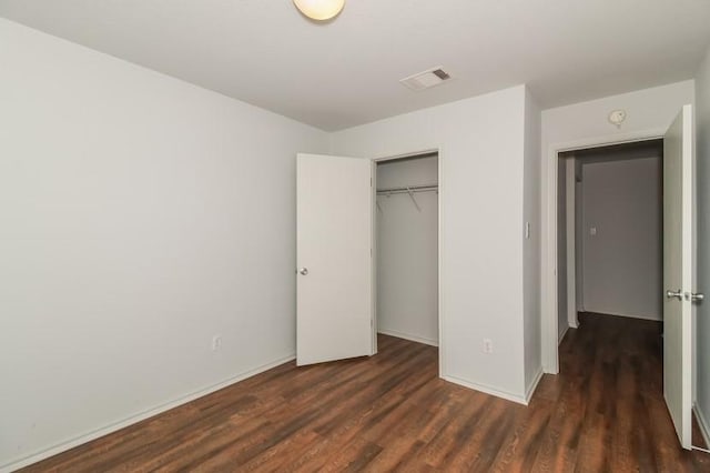 13604 Sierra Wind Ln, Elgin, TX 78621 - unfurnished bedroom with wood finished floors and a closet
