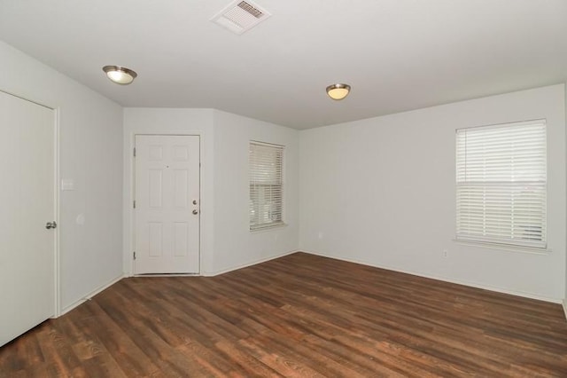 13604 Sierra Wind Ln, Elgin, TX 78621 - spare room with wood finished floors and baseboards