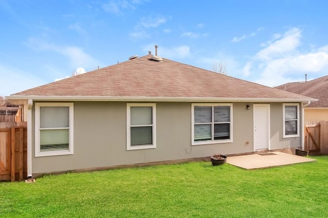 13604 Sierra Wind Ln, Elgin, TX 78621 - rear view of property featuring a shingled roof, a patio, and stucco siding
