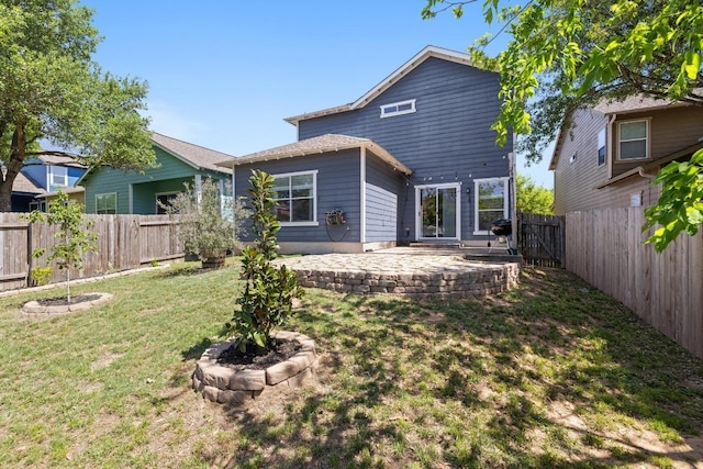 2025 Wayward Sun Dr, Austin, TX 78754 - back of property featuring a fenced backyard and a patio area