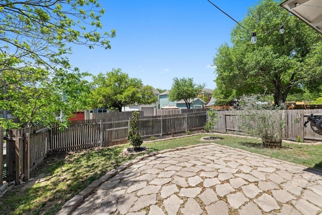 2025 Wayward Sun Dr, Austin, TX 78754 - fenced backyard featuring a patio