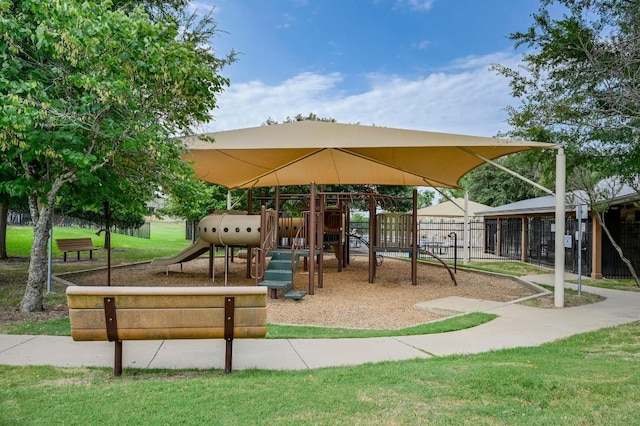 2025 Wayward Sun Dr, Austin, TX 78754 - surrounding community with a yard and heating fuel