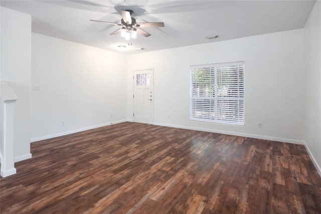 2025 Wayward Sun Dr, Austin, TX 78754 - unfurnished living room with dark wood finished floors and a ceiling fan
