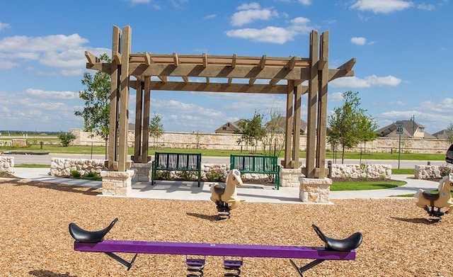 view of property's community with a pergola
