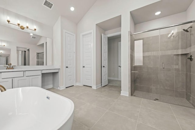 212 Ranchland Pass, Liberty Hill, TX 78642 - full bathroom featuring a freestanding bath, a shower stall, vanity, baseboards, and recessed lighting