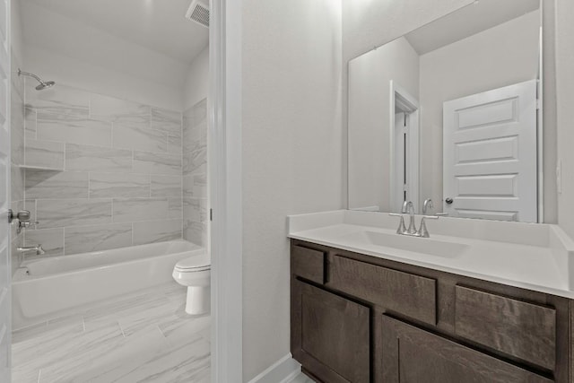 212 Ranchland Pass, Liberty Hill, TX 78642 - full bathroom with vanity, toilet, shower / bathtub combination, marble look tiles, and baseboards