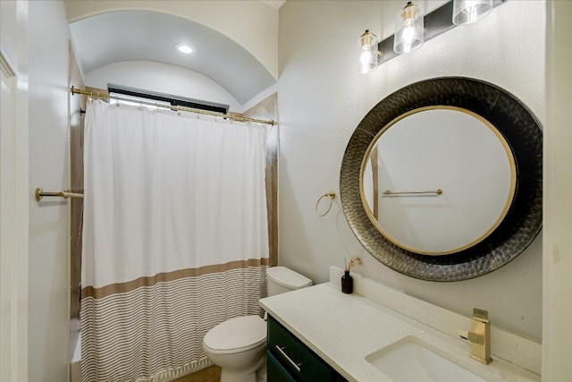full bathroom with vanity, toilet, and curtained shower