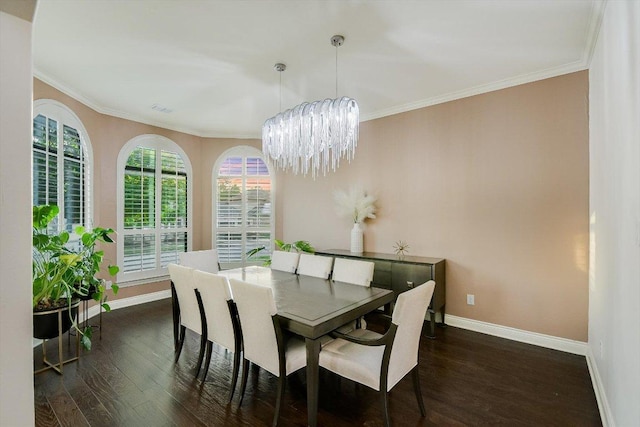 dining space featuring baseboards, dark wood-type flooring, and a chandelier
