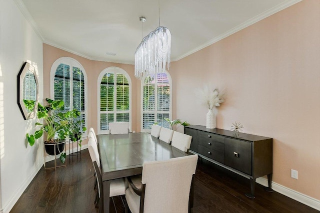 dining area with crown molding, a chandelier, baseboards, dark wood-type flooring, and visible vents