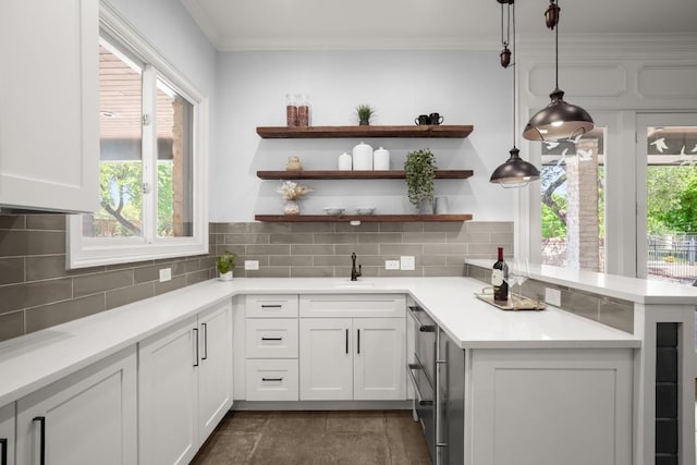 9400 Bell Mountain Dr, Austin, TX 78730 - kitchen featuring white cabinetry, backsplash, a peninsula, and light countertops