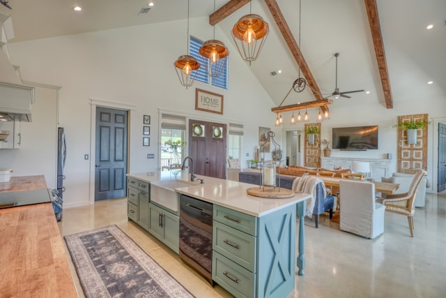 452 Sandy Cemetery Rd, Johnson City, TX 78636 - kitchen featuring high vaulted ceiling, green cabinetry, light countertops, a sink, and beam ceiling