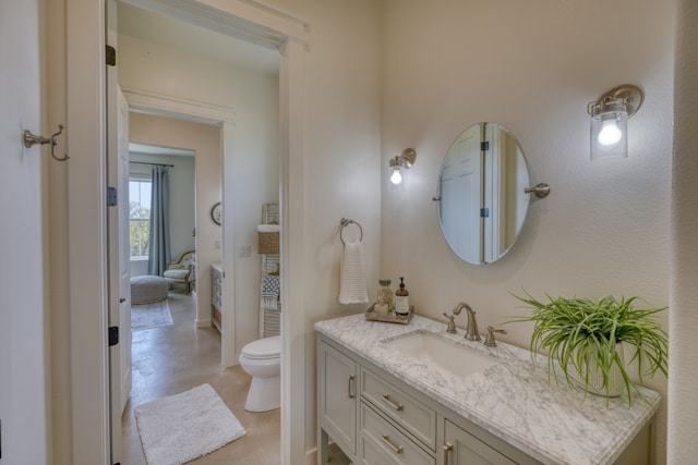 452 Sandy Cemetery Rd, Johnson City, TX 78636 - bathroom with toilet, vanity, and ensuite bath