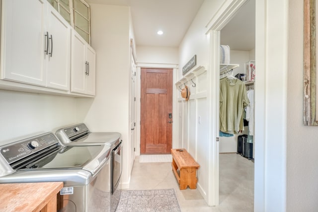 452 Sandy Cemetery Rd, Johnson City, TX 78636 - clothes washing area featuring recessed lighting, cabinet space, and washer and clothes dryer