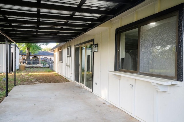 view of patio / terrace featuring fence