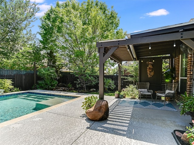 view of pool with a fenced backyard, a patio, and a fenced in pool