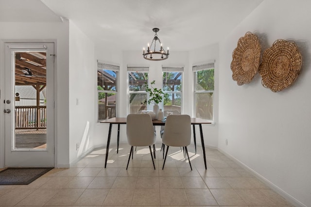 510 Sunny Brook Dr, Leander, TX 78641 - dining area with a chandelier and light tile patterned floors