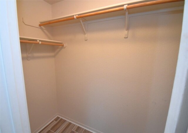 2305 Love Rd, Killeen, TX 76542 - spacious closet with wood finished floors