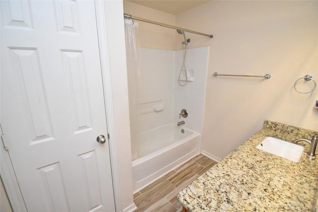 2305 Love Rd, Killeen, TX 76542 - full bath featuring shower / bathtub combination with curtain, wood finish floors, vanity, and baseboards