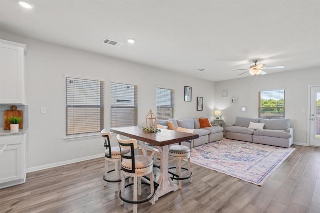 506 Windy Reed Rd, Hutto, TX 78634 - living room with light wood-type flooring, a ceiling fan, and recessed lighting
