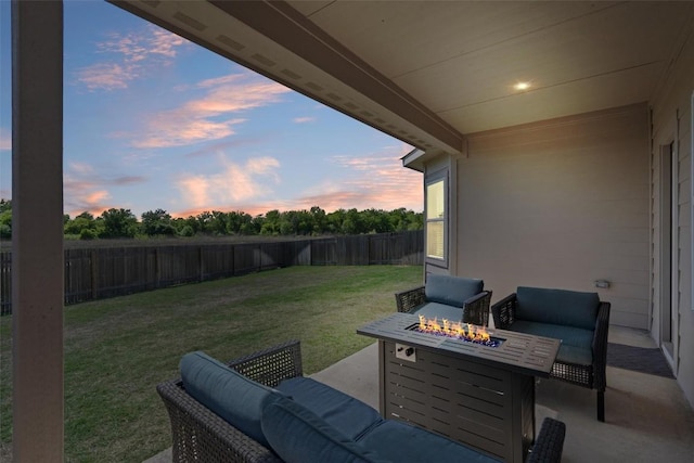 506 Windy Reed Rd, Hutto, TX 78634 - fenced backyard with a patio and an outdoor living space with a fire pit