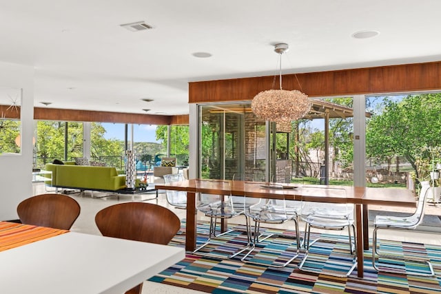 5322 Western Hills Dr, Austin, TX 78731 - dining area featuring a chandelier and visible vents