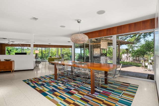 5322 Western Hills Dr, Austin, TX 78731 - dining area with wooden walls and visible vents