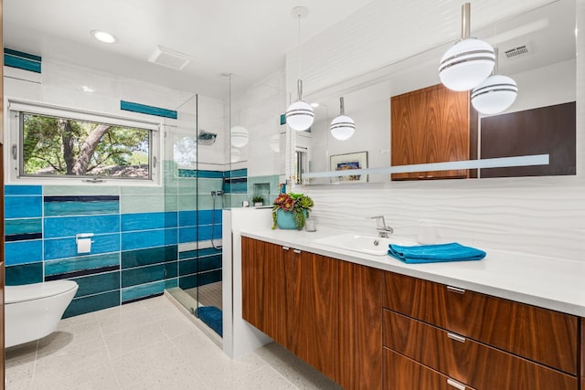5322 Western Hills Dr, Austin, TX 78731 - full bathroom featuring a shower stall, vanity, visible vents, and toilet