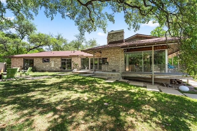 5322 Western Hills Dr, Austin, TX 78731 - rear view of house with a chimney and a yard