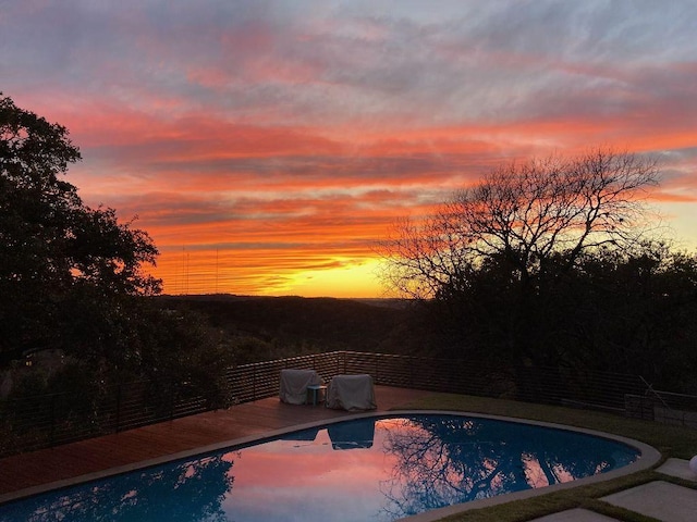 5322 Western Hills Dr, Austin, TX 78731 - pool at dusk featuring an outdoor pool and a deck