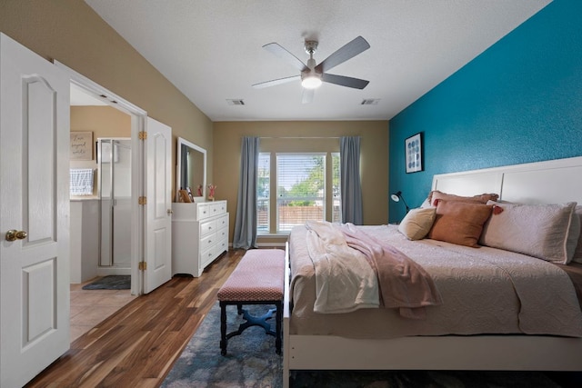 20300 Wayzata Ct, Pflugerville, TX 78660 - bedroom with wood finished floors and ceiling fan