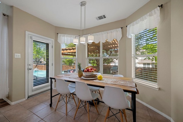 20300 Wayzata Ct, Pflugerville, TX 78660 - tiled dining space with baseboards