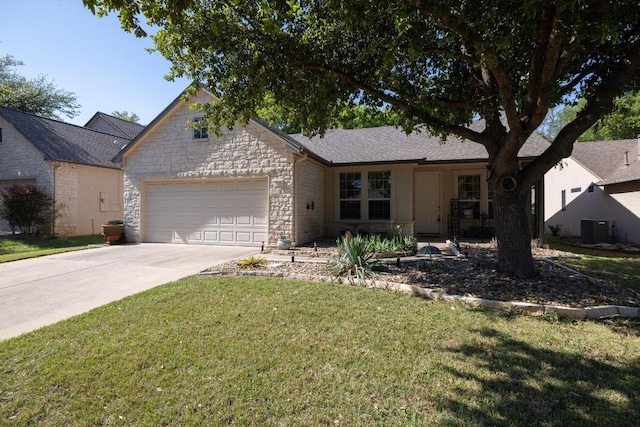 116 Buttercup Trl, Georgetown, TX 78633 - view of front facade featuring a garage, driveway, a front lawn, and stone siding
